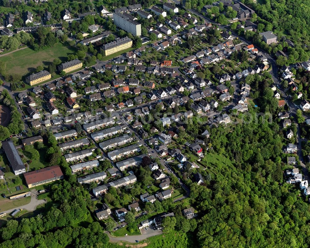 Aerial image Koblenz - View of the Asterstein part of Koblenz in the state Rhineland-Palatinate. Koblenz is located on both sides of the rivers Rhine and Moselle and is surrounded by hills and fields. It is a university town and one of the oldest towns of Germany. The Asterstein part is located on the right riverbank of the Rhine and is mainly a residential area. It is home to the firefighters school of the state