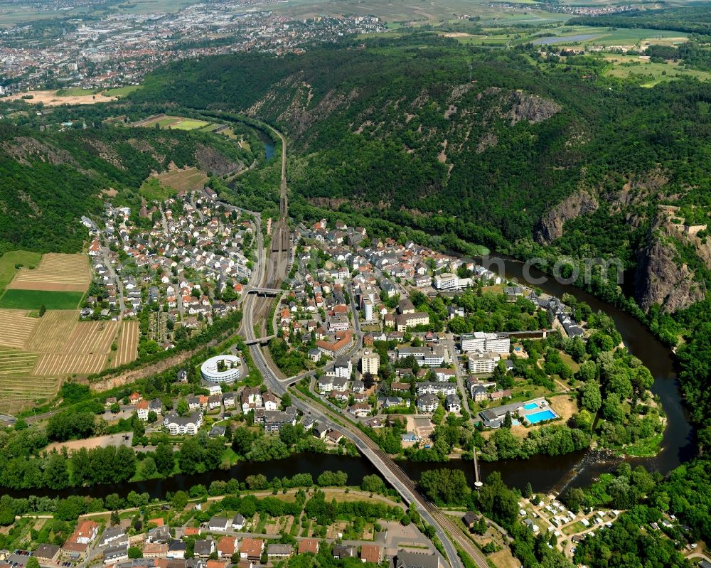 Bad Münster am Stein-Ebernburg from above - View of the Bad Muenster am Stein-Ebernburg part of Bad Kreuznach in the state of Rhineland-Palatinate. Bad Muenster is a spa resort and has been made a district of Bad Kreuznach in 2014. It is located in the valley of the river Nahe, surrounded by forest which are landmarks and important tourist sites, forest and vineyards