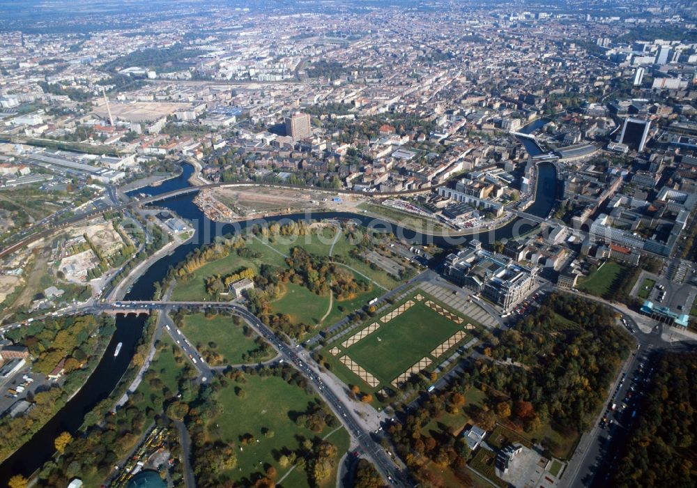 Berlin from above - District View of Berlin with the Reichstag building at the Republic Square and the River Spree. In the middle Charité University Hospital is seen