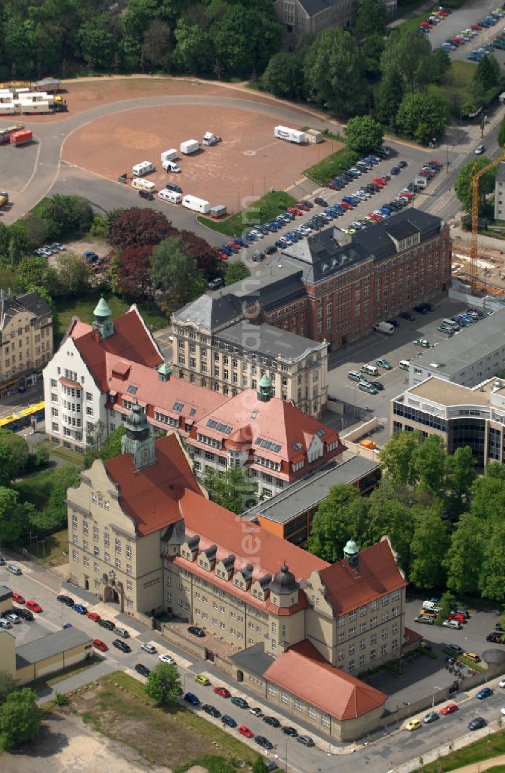 Aerial photograph Chemnitz - Building complexes of vocational school BSZ für Technik II - Handwerkerschule Chemnitz at Schlossstrasse and police station Chemnitz-Mitte at Hartmanstrasse, as well as a site of vocational education and training center WBS Training AG at Promenadenstrasse in the centre of Chemnitz, Saxony