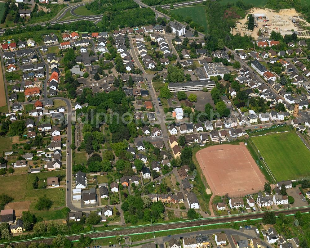 Neuwied from the bird's eye view: View of the Engers part of the town of Neuwied in the state of Rhineland-Palatinate. The town is located in the county district of Mayen-Koblenz on the right riverbank of the river Rhine. The town is an official tourist resort and is an important historic industrial site. The Engers part is located in its East and consists widely of residential estates and single family homes