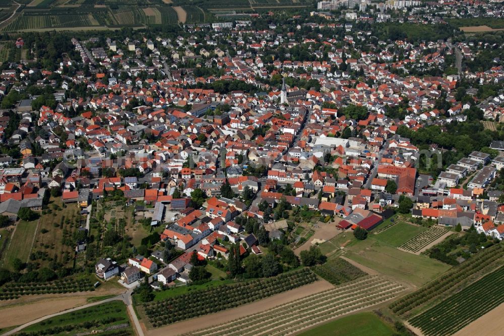 Aerial photograph Mainz - View of the Finthen district of Mainz in the state of Rhineland-Palatinate. The most Western district includes several residential areas and estates and is surrounded by fields, meadows and wooded hills