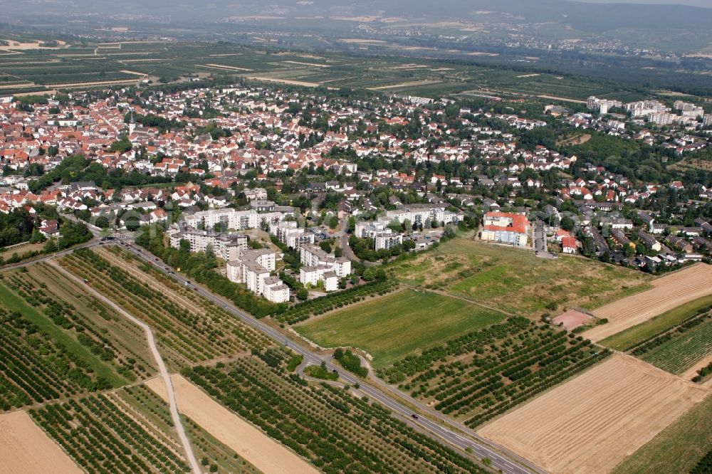 Aerial photograph Mainz - View of the Finthen district of Mainz in the state of Rhineland-Palatinate. The most Western district includes several residential areas and estates and is surrounded by fields, meadows and wooded hills