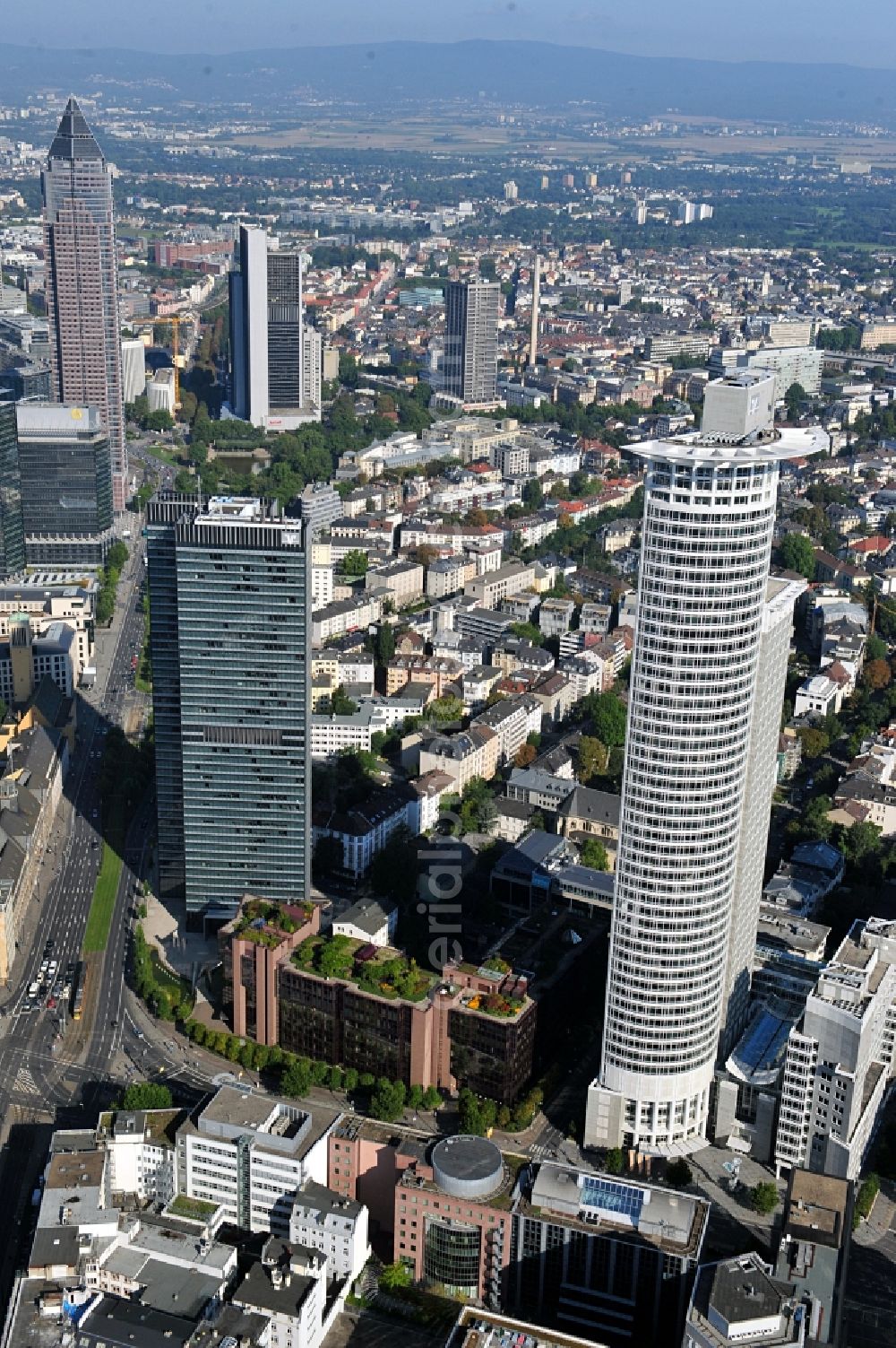 Frankfurt am Main from above - View of the districts Westend and Gallus in Frankfurt / Main. Prominent buildings are the Westend Tower on Mainzer Landstraße, the City Hochhaus and the Forum Frankfurt on Friedrich-Ebert-Anlage and the Messeturm on Hamburger Allee