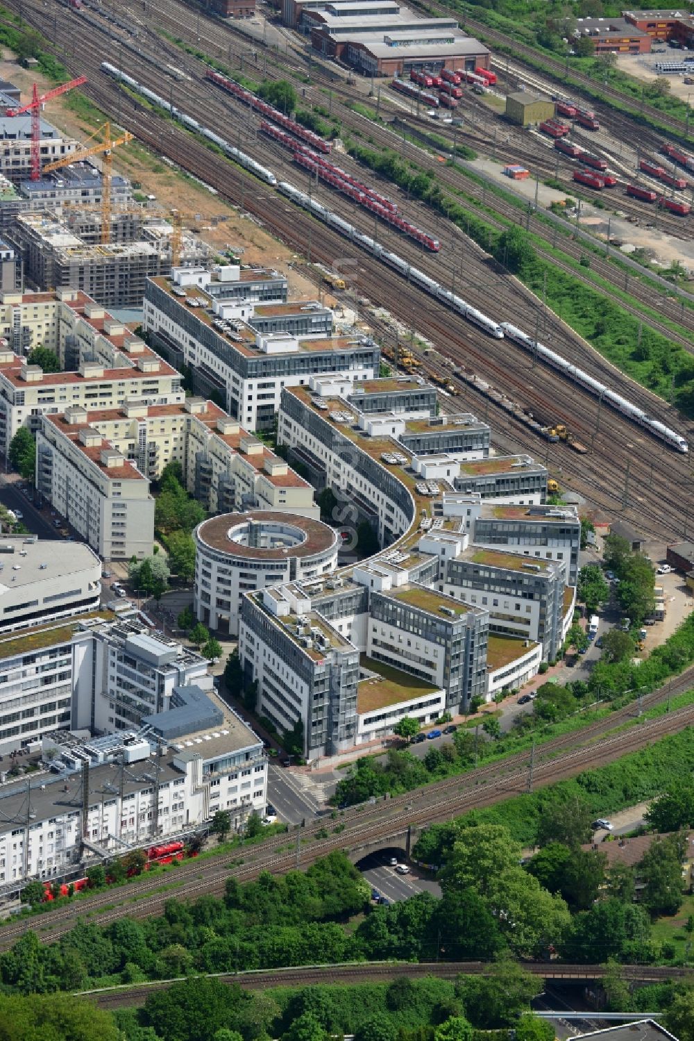 Frankfurt am Main from above - View of the Galluspark part of the Gallus part of Frankfurt in the state Hesse. The whole complex is located between Kleyerstrasse and the rail tracks on site of the former Adler works. It was started in 1992 and includes 220.000 m² of office, commercial and residential buildings. It was built energy efficiently