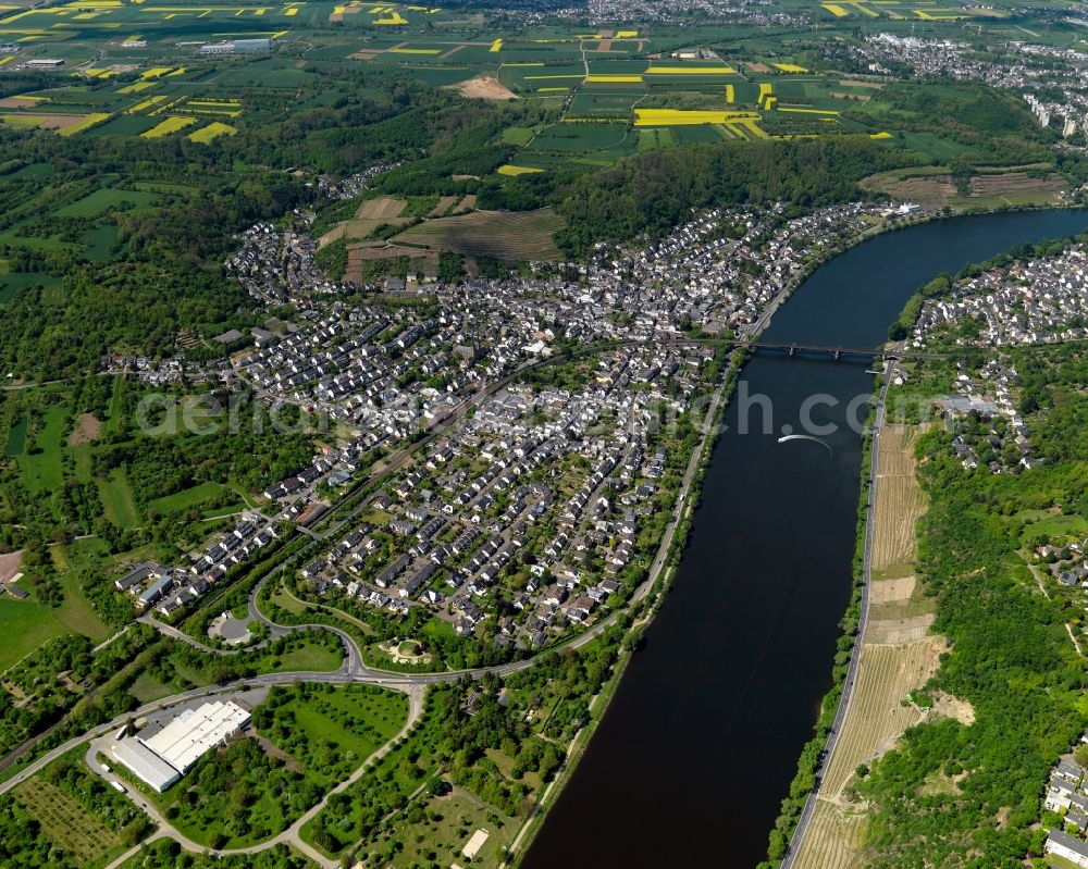 Aerial image Koblenz - View of the Guels part of Koblenz in the state Rhineland-Palatinate. Guels is located on the left riverbank of the river Moselle. A bit further away from the town centre, it is surrounded by hills and meadows and a pure residential area