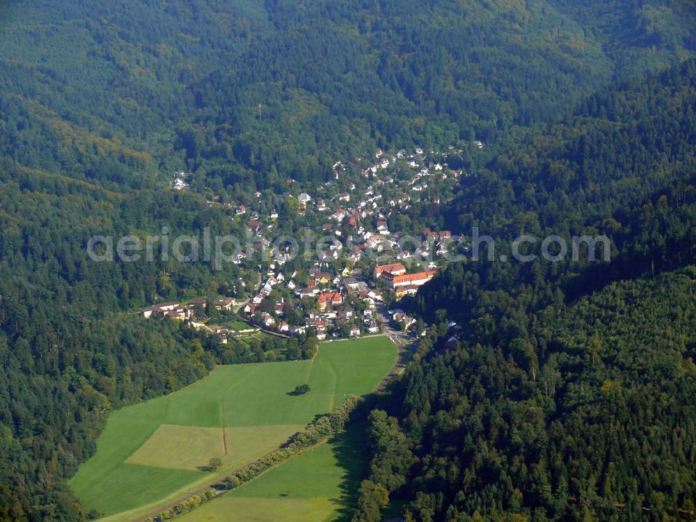 Aerial image Freiburg im Breisgau - Stadtteilansicht von Günterstal, geprägt durch Mehrfamilienhäuser und die Liebfrauenkirche, im Bohrer-Tal am Fuße des Berges Schauinsland in Freiburg, Baden-Württemberg. Cityscape of the district Günterstal, characterized by blocks of flats and the church Liebfrauenkirche, at the foot of the mountain Schauinsland in the valley Bohrer Tal in Freiburg, Baden-Wuerttemberg.