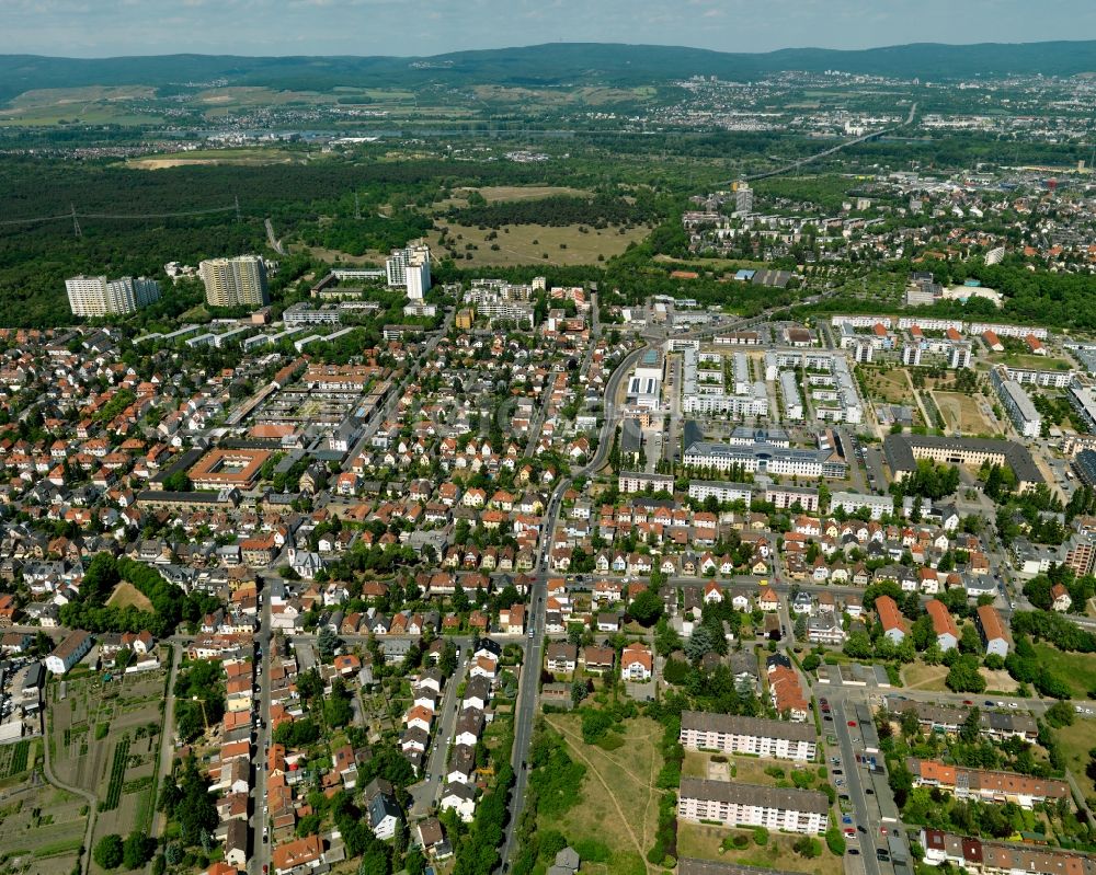 Mainz from above - View of the Gonsenheim district of Mainz in the state of Rhineland-Palatinate. The second-largest district of Mainz is located in the Northwest of the city and is surrounded by the federal motorways A60 and A643. On its western edge, there are wooded areas. The district includes several sports facilities and residential estates