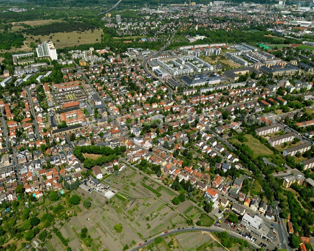 Mainz from the bird's eye view: View of the Gonsenheim district of Mainz in the state of Rhineland-Palatinate. The second-largest district of Mainz is located in the Northwest of the city and is surrounded by the federal motorways A60 and A643. On its western edge, there are wooded areas. The district includes several sports facilities and residential estates