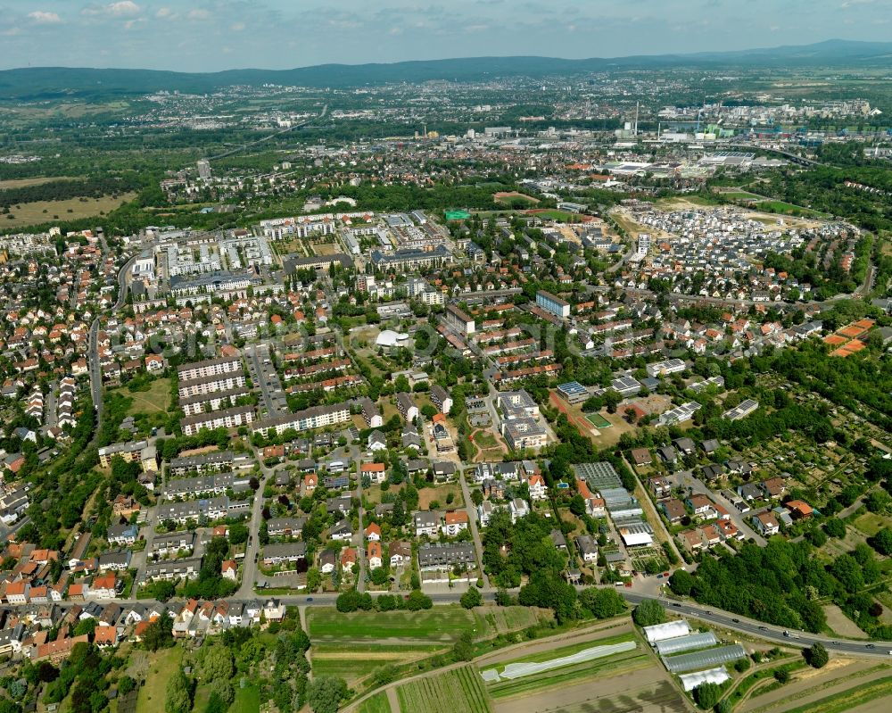 Mainz from the bird's eye view: View of the Gonsenheim district of Mainz in the state of Rhineland-Palatinate. The second-largest district of Mainz is located in the Northwest of the city and is surrounded by the federal motorways A60 and A643. On its western edge, there are wooded areas. The district includes several sports facilities and residential estates