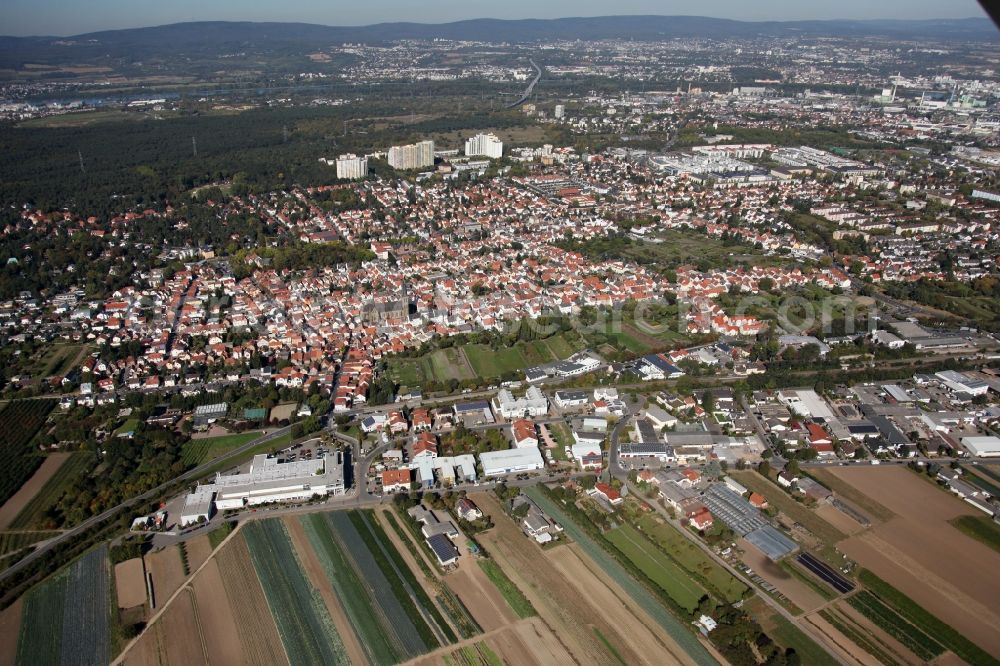 Mainz from the bird's eye view: View of the Gonsenheim district of Mainz in the state of Rhineland-Palatinate. The second-largest district of Mainz is located in the Northwest of the city and is surrounded by the federal motorways A60 and A643. On its western edge, there are wooded areas. The district includes several sports facilities and residential estates