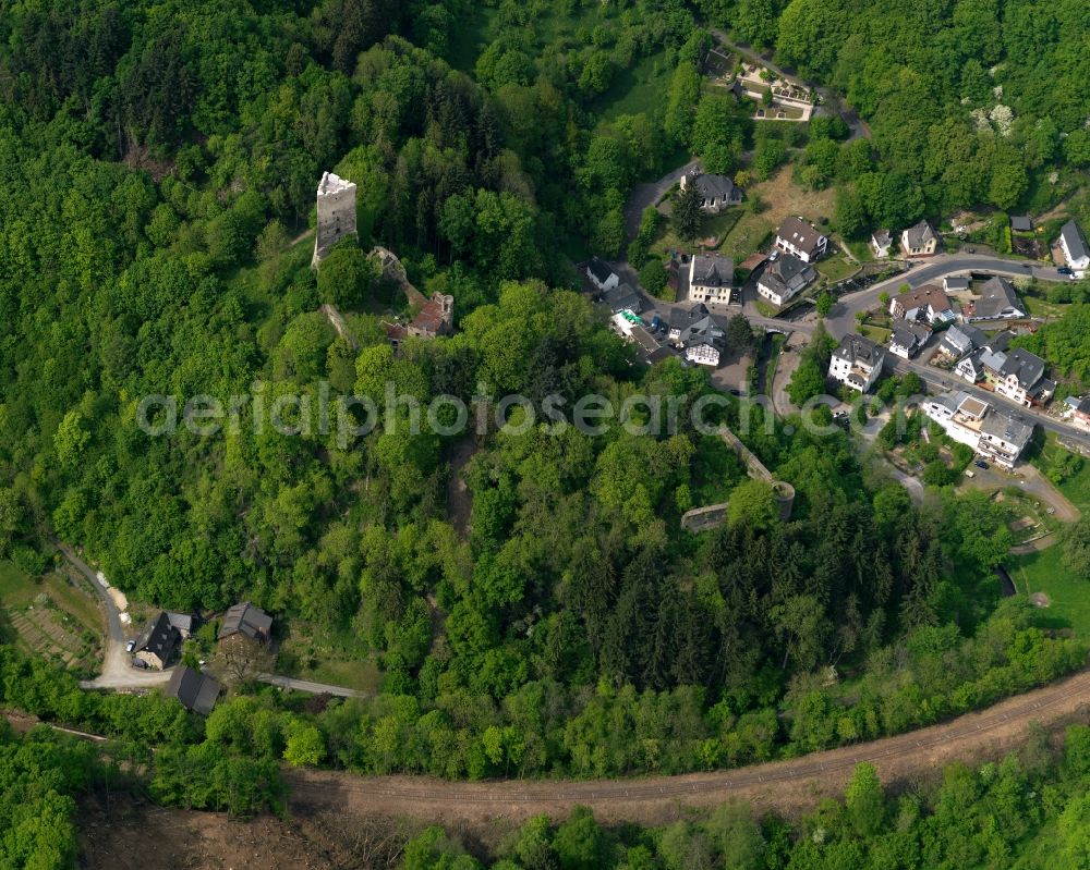 Aerial image Höhr-Grenzhausen - View of the Grenzau part of the town of Hoehr-Grenzhausen and Grenzau Castle in the state of Rhineland-Palatinate. The town is located in the county district of Westerwaldkreis, in the Kannenbaeckerland region. It is an official tourist resort. Grenzau is located in the North of the town area, surrounded by hills and forest. The castle is a ruin, located above the Grenzau part and is the only castle in Germany with a triangular castle keep