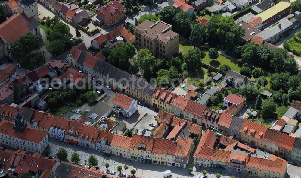 Greußen from the bird's eye view: Partial town view of Greussen in the state of Thuringia with view of the city's market square, on which the restored Town Hall is located, and the public regular school in the street Herrenstrasse