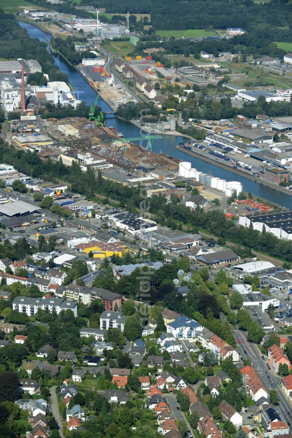 Osnabrück from above - Docks and terminals with warehouses and freight forwarding and logistics companies in the Hafen part of Osnabrueck in the state of Lower Saxony. The harbour is located at the End of Stich Canal and includes logistics companies and offices