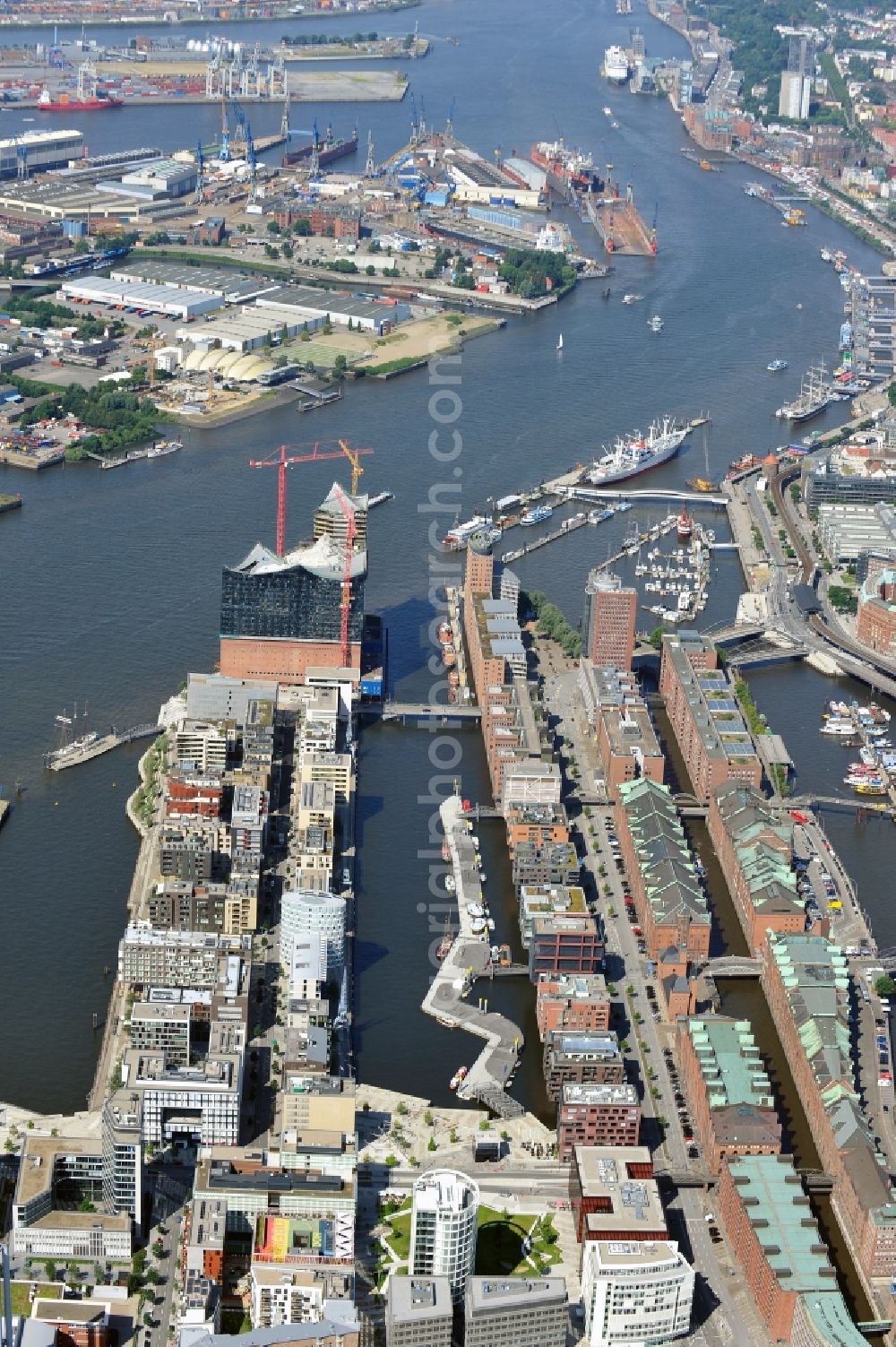 Hamburg from above - View of waterfront Hafencity in Hamburg. Hafencity is a district in the middle of Hamburg. It exists of the area of the Großer Grasbrook, the northern part of the former isle Grasbrook, and the Speicherstadt on the former isles Kehrwieder and Wandrahm