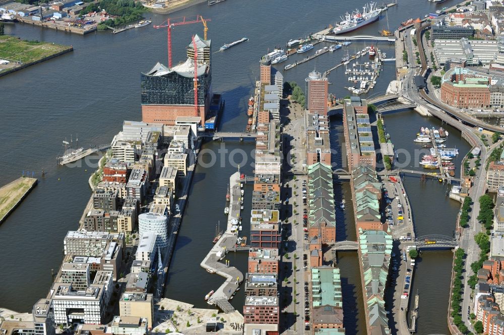 Hamburg from the bird's eye view: View of waterfront Hafencity in Hamburg. Hafencity is a district in the middle of Hamburg. It exists of the area of the Großer Grasbrook, the northern part of the former isle Grasbrook, and the Speicherstadt on the former isles Kehrwieder and Wandrahm