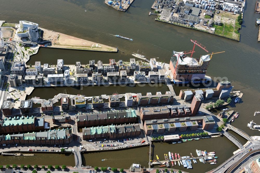 Hamburg from above - View of waterfront Hafencity in Hamburg. Hafencity is a district in the middle of Hamburg. It exists of the area of the Großer Grasbrook, the northern part of the former isle Grasbrook, and the Speicherstadt on the former isles Kehrwieder and Wandrahm