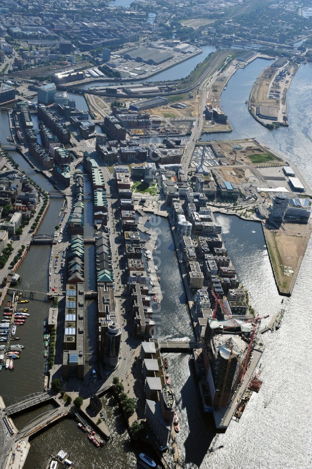 Hamburg from the bird's eye view: View of waterfront Hafencity in Hamburg. Hafencity is a district in the middle of Hamburg. It exists of the area of the Großer Grasbrook, the northern part of the former isle Grasbrook, and the Speicherstadt on the former isles Kehrwieder and Wandrahm