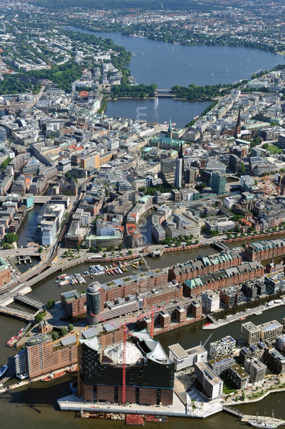 Aerial photograph Hamburg - View of waterfront Hafencity in Hamburg. Hafencity is a district in the middle of Hamburg. It exists of the area of the Großer Grasbrook, the northern part of the former isle Grasbrook, and the Speicherstadt on the former isles Kehrwieder and Wandrahm