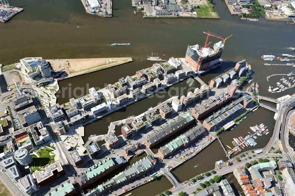 Hamburg from above - View of waterfront Hafencity in Hamburg. Hafencity is a district in the middle of Hamburg. It exists of the area of the Großer Grasbrook, the northern part of the former isle Grasbrook, and the Speicherstadt on the former isles Kehrwieder and Wandrahm