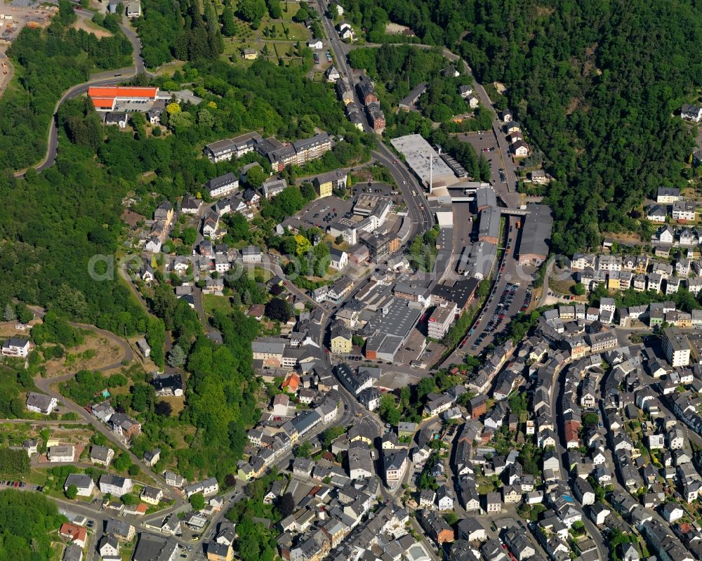 Idar-Oberstein from above - View of Idar-Oberstein in the state Rhineland-Palatinate. The large town is located in the county district of Birkenfeld and consists of three old parts - like Idar - and several incorporated villages. Idar-Oberstein is located on the Southern edge of the Hunsrueck region on both sides of the river Nahe. The Northwest of the town centre includes several factories and companies