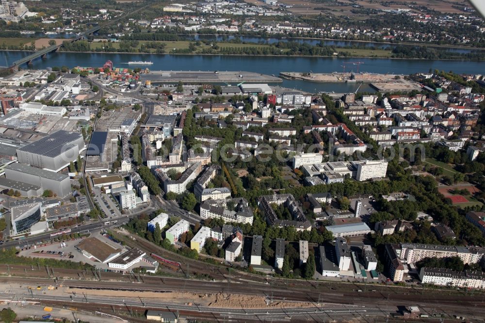 Mainz from above - View of the industrial area in the Neustadt part of Mainz in the state of Rhineland-Palatinate. View of the industrial area in the North of the city. The custom harbour of Mainz on the Rhine is visible in the background. The facilities of the Schott Glas Works are located in the West of the Rhine and are surrounded by railway tracks