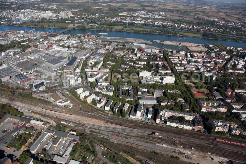 Aerial photograph Mainz - View of the industrial area in the Neustadt part of Mainz in the state of Rhineland-Palatinate. View of the industrial area in the North of the city. The custom harbour of Mainz on the Rhine is visible in the background. The facilities of the Schott Glas Works are located in the West of the Rhine and are surrounded by railway tracks