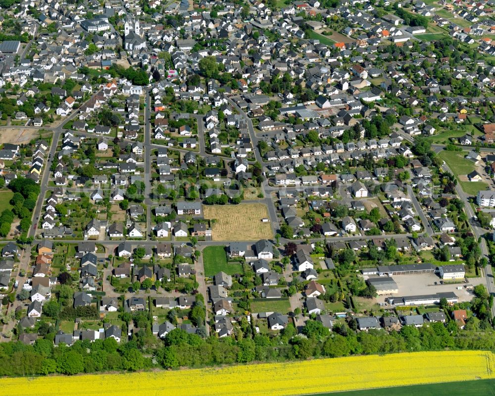 Aerial photograph Polch - View of the historic town centre of Polch in the state of Rhineland-Palatinate. The agricultural town is located in the county district of Mayen-Koblenz in the borough of Maifeld, in the South of the federal motorway A 48. Its historic centre consists of residential buildings as well as the catholic parochial church of Saint Stephan with its twin towers