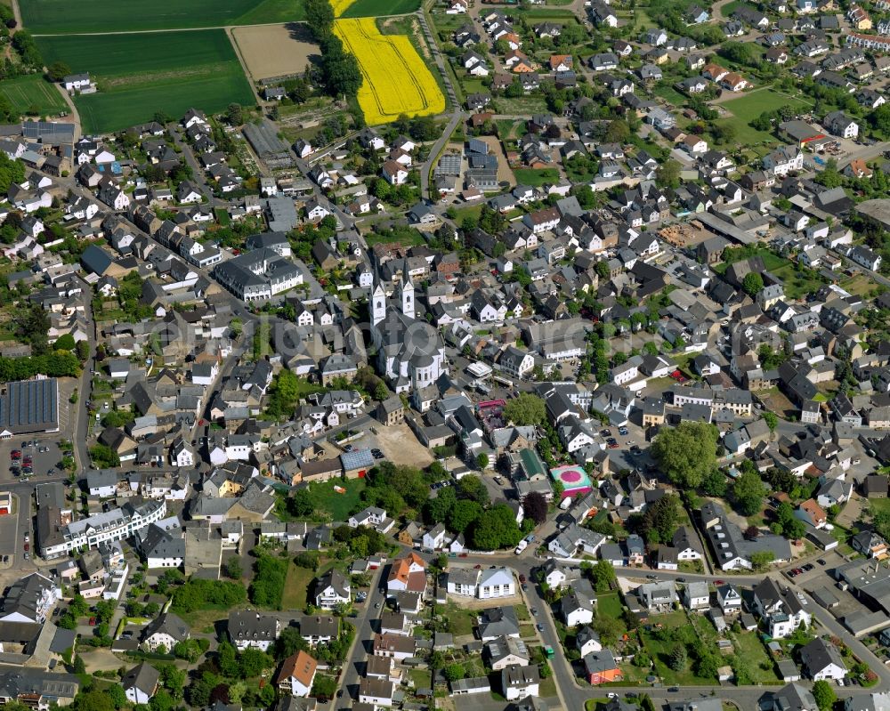 Polch from above - View of the historic town centre of Polch in the state of Rhineland-Palatinate. The agricultural town is located in the county district of Mayen-Koblenz in the borough of Maifeld, in the South of the federal motorway A 48. Its historic centre consists of residential buildings as well as the catholic parochial church of Saint Stephan with its twin towers