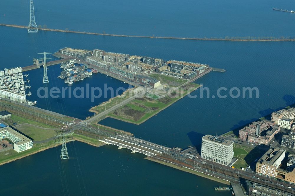 Aerial image Amsterdam - View at the island Steigereiland and the bridges IJburglaan and Zeeburgerbrug in Amsterdam in the province of North Holland in the Netherlands. Steigereiland is one of seven artificial islands of the district IJburg