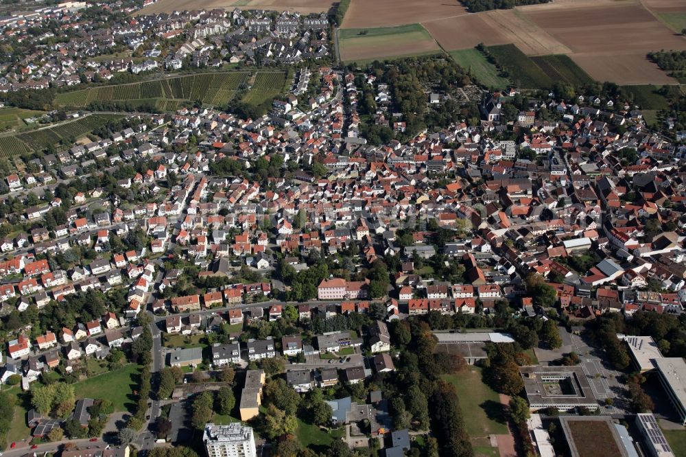 Mainz from above - View of the Laubenheim part of Mainz in the state of Rhineland-Palatinate. The district consists of historic residential and business buildings as well as estates and appartment blocks. It is located on the riverbank of the Rhine, in the South of Mainz, and is partly surrounded by fields and agricultural land