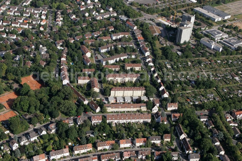 Aerial image Mainz - View of the Laubenheim part of Mainz in the state of Rhineland-Palatinate. The district consists of historic residential and business buildings as well as estates and appartment blocks. It is located on the riverbank of the Rhine, in the South of Mainz, and is partly surrounded by fields and agricultural land