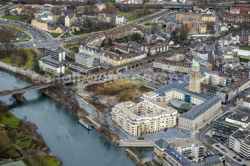 Aerial image Mülheim - Partial view of the city of Mülheim, the refurbished City Hall, the civil administration and of the river Ruhr in the state North Rhine-Westphalia. In the new building of the city hall is now the registrar's office and the regulatory agency located