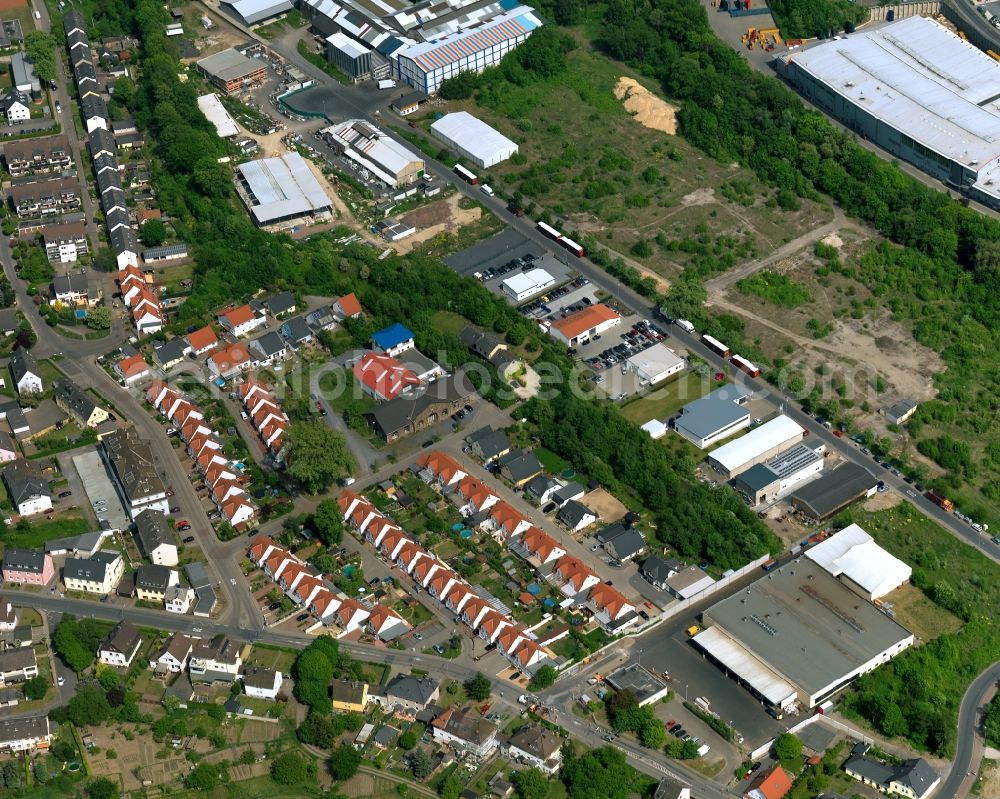 Aerial image Bendorf - View of the Muelhofen part of the town of Bendorf in the state of Rhineland-Palatinate. The town is located in the county district of Mayen-Koblenz on the right riverbank of the river Rhine. The town is an official tourist resort and is located on the German Limes Road. It consists of the four parts Bendorf, Sayn, Muelhofen and Stromberg. Muelhofen is located in the West of Bendorf