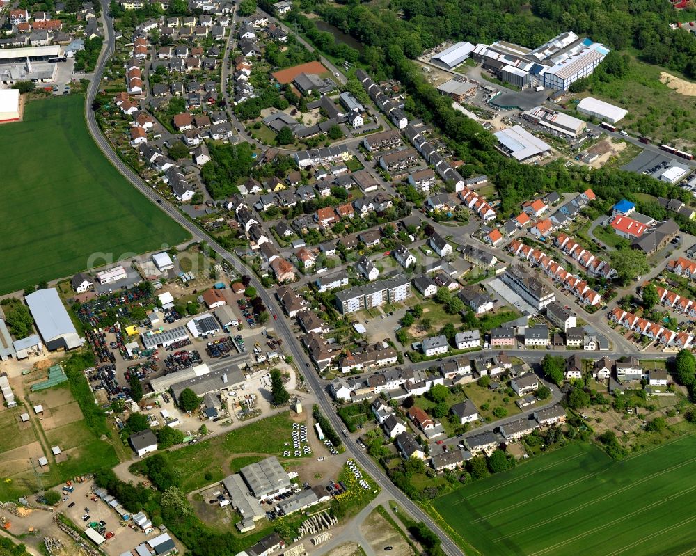 Aerial photograph Bendorf - View of the Muelhofen part of the town of Bendorf in the state of Rhineland-Palatinate. The town is located in the county district of Mayen-Koblenz on the right riverbank of the river Rhine. The town is an official tourist resort and is located on the German Limes Road. It consists of the four parts Bendorf, Sayn, Muelhofen and Stromberg. Muelhofen is located in the West of Bendorf