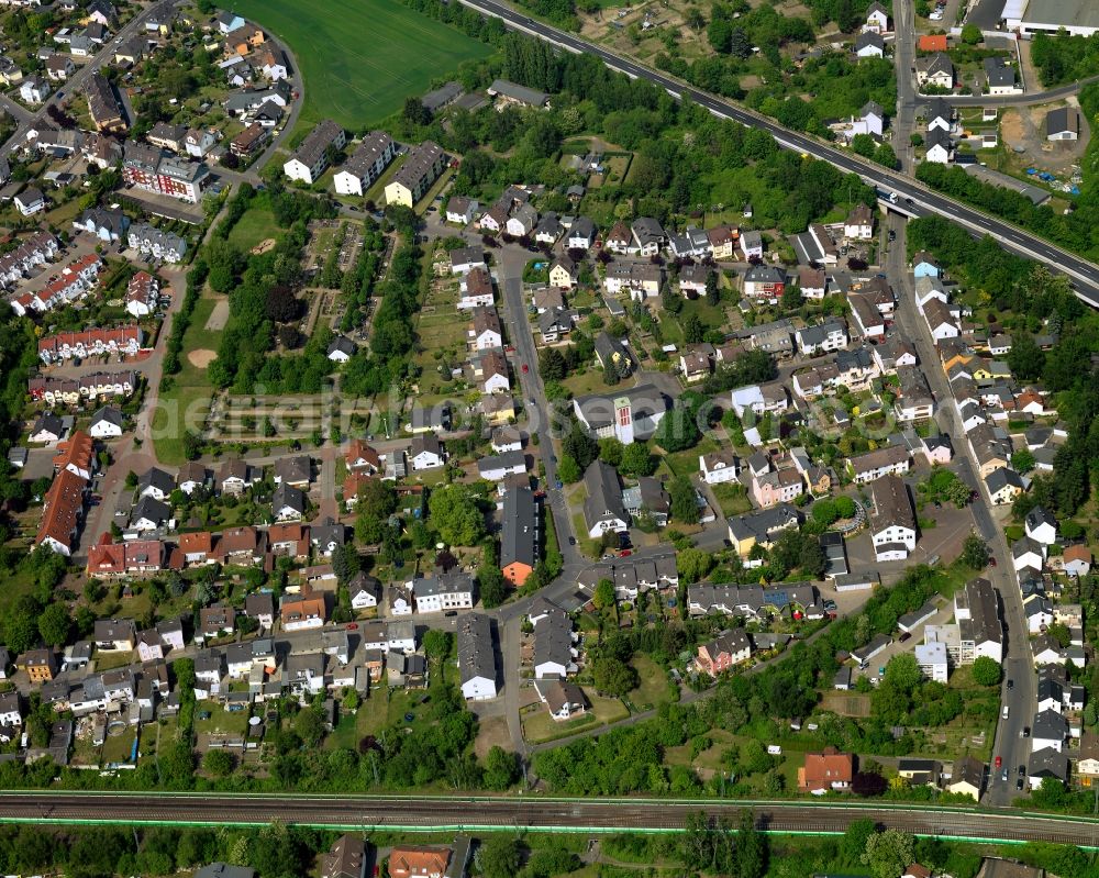 Aerial image Bendorf - View of the Muelhofen part of the town of Bendorf in the state of Rhineland-Palatinate. The town is located in the county district of Mayen-Koblenz on the right riverbank of the river Rhine. The town is an official tourist resort and is located on the German Limes Road. It consists of the four parts Bendorf, Sayn, Muelhofen and Stromberg. Muelhofen is located in the West of Bendorf