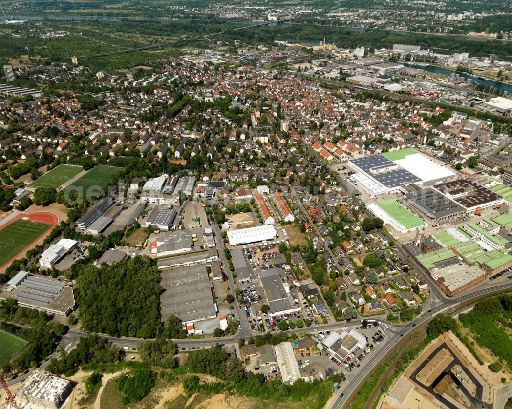 Mainz from above - View of the Mombach district of Mainz in the state of Rhineland-Palatinate. The Northern-most district is located on the river Rhine and borders the federal motorway A643 in the West. The former industrial borough is characterised by businesses, commercial areas and extensive green spaces. The East of the district includes wide industrial areas and the historic Phoenix Event Location