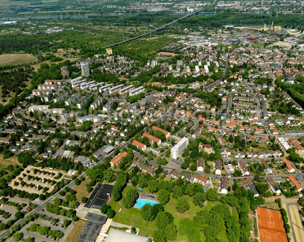 Mainz from the bird's eye view: View of the Mombach district of Mainz in the state of Rhineland-Palatinate. The Northern-most district is located on the river Rhine and borders the federal motorway A643 in the West. The former industrial borough is characterised by businesses, commercial areas and extensive green spaces. The East of the district includes wide industrial areas and the historic Phoenix Event Location