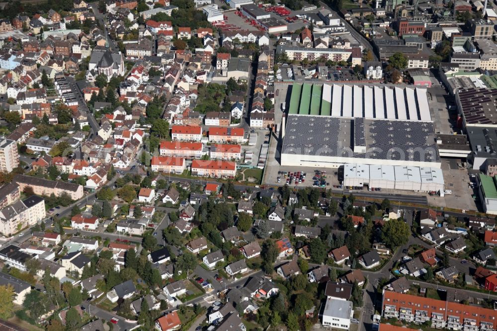 Aerial image Mainz - View of the Mombach district of Mainz in the state of Rhineland-Palatinate. The Northern-most district is located on the river Rhine and borders the federal motorway A643 in the West. The former industrial borough is characterised by businesses, commercial areas and extensive green spaces. The East of the district includes wide industrial areas and the historic Phoenix Event Location