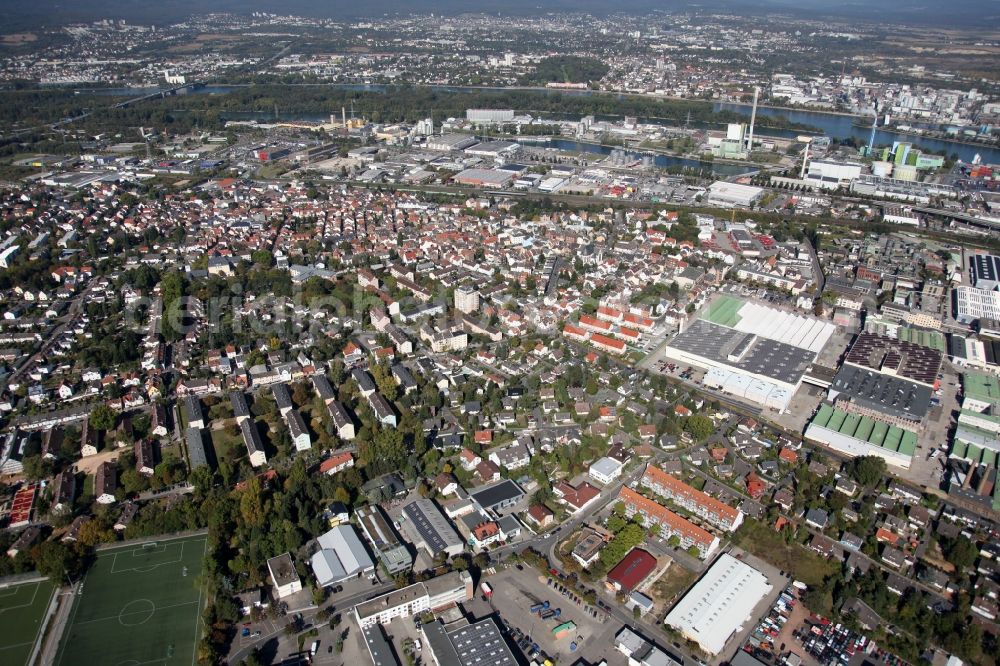 Aerial image Mainz - View of the Mombach district of Mainz in the state of Rhineland-Palatinate. The Northern-most district is located on the river Rhine and borders the federal motorway A643 in the West. The former industrial borough is characterised by businesses, commercial areas and extensive green spaces. The East of the district includes wide industrial areas and the historic Phoenix Event Location