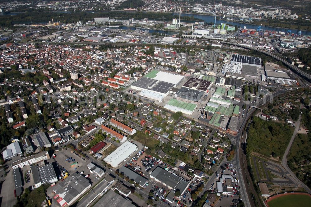 Aerial image Mainz - View of the Mombach district of Mainz in the state of Rhineland-Palatinate. The Northern-most district is located on the river Rhine and borders the federal motorway A643 in the West. The former industrial borough is characterised by businesses, commercial areas and extensive green spaces. The East of the district includes wide industrial areas and the historic Phoenix Event Location