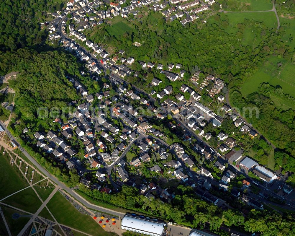 Aerial image Koblenz - View of the Niederberg part of Koblenz in the state Rhineland-Palatinate. Koblenz is located on both sides of the rivers Rhine and Moselle and is surrounded by hills and fields. It is a university town and one of the oldest towns of Germany. The Niederberg part is located on the right riverbank of the Rhine and is a place of pilgrimage