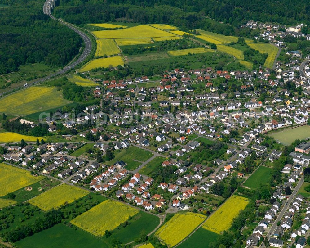 Neuwied from the bird's eye view: View of the Oberbieber part of the town of Neuwied in the state of Rhineland-Palatinate. The town is located in the county district of Mayen-Koblenz on the right riverbank of the river Rhine. The town is an official tourist resort and is an important historic industrial site. Oberbieber is located in its North, surrounded by meadows and rapeseed fields in the foothills of the Westerwald forest. The historic roads Limesstrasse, Raiffeisenstrasse and the hiking track Rheinsteig meet here