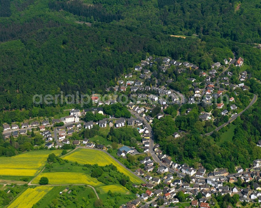 Aerial image Neuwied - View of the Oberbieber part of the town of Neuwied in the state of Rhineland-Palatinate. The town is located in the county district of Mayen-Koblenz on the right riverbank of the river Rhine. The town is an official tourist resort and is an important historic industrial site. Oberbieber is located in its North, surrounded by meadows and rapeseed fields in the foothills of the Westerwald forest. The historic roads Limesstrasse, Raiffeisenstrasse and the hiking track Rheinsteig meet here