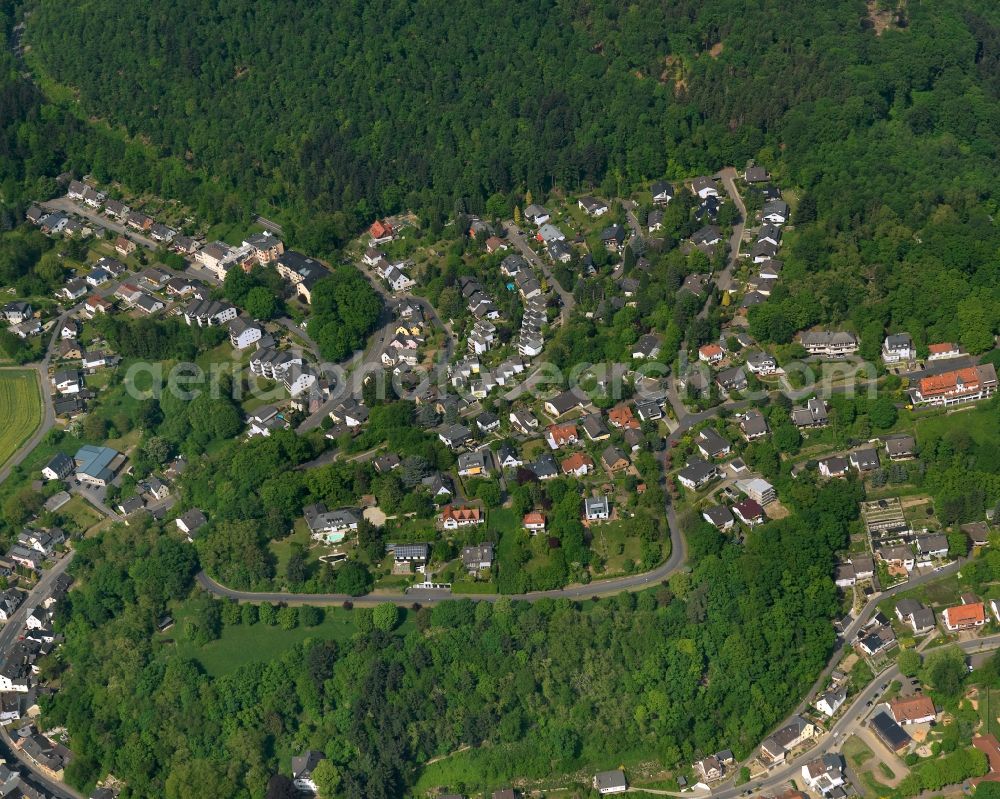 Aerial photograph Neuwied - View of the Oberbieber part of the town of Neuwied in the state of Rhineland-Palatinate. The town is located in the county district of Mayen-Koblenz on the right riverbank of the river Rhine. The town is an official tourist resort and is an important historic industrial site. Oberbieber is located in its North, in the foothills of the Westerwald forest. The historic roads Limesstrasse, Raiffeisenstrasse and the hiking track Rheinsteig meet here