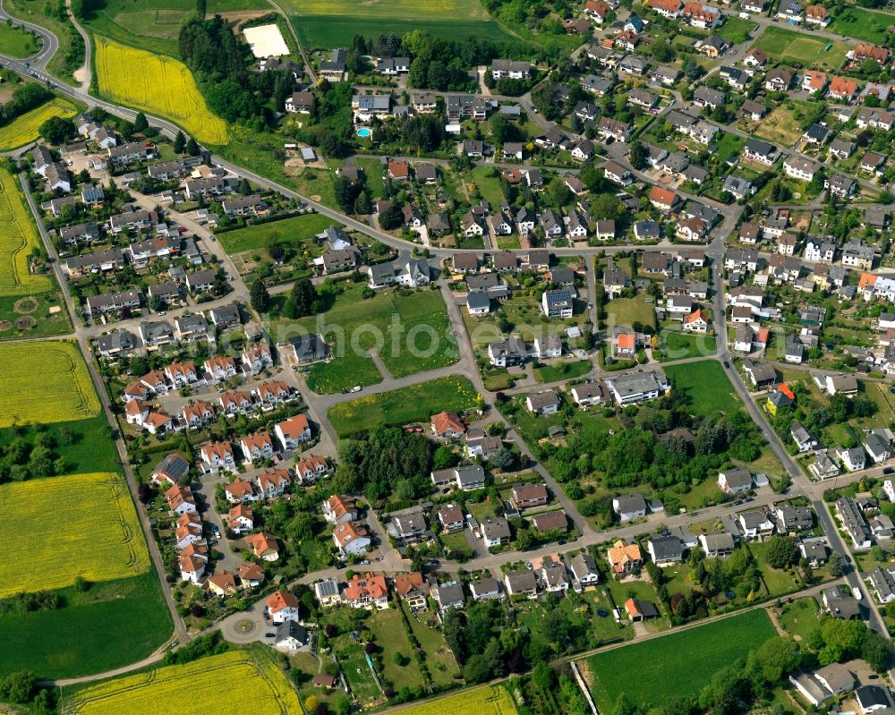 Neuwied from the bird's eye view: View of the Oberbieber part of the town of Neuwied in the state of Rhineland-Palatinate. The town is located in the county district of Mayen-Koblenz on the right riverbank of the river Rhine. The town is an official tourist resort and is an important historic industrial site. Oberbieber is located in its North, surrounded by meadows and rapeseed fields in the foothills of the Westerwald forest. The historic roads Limesstrasse, Raiffeisenstrasse and the hiking track Rheinsteig meet here