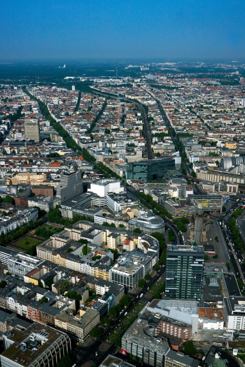 Berlin from above - View of the borough of Charlottenburg City West along Kurfuerstendamm in Berlin in Germany. View from Breitscheidplatz with the Protestant Kaiser Wilhelm Memorial Church to the West