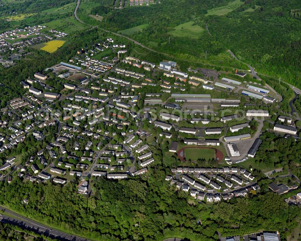 Aerial photograph Koblenz - View of the Niederberg part of Koblenz in the state Rhineland-Palatinate. Koblenz is located on both sides of the rivers Rhine and Moselle and is surrounded by hills and fields. It is a university town and one of the oldest towns of Germany. The Niederberg part is located on the right riverbank of the Rhine and is a place of pilgrimage