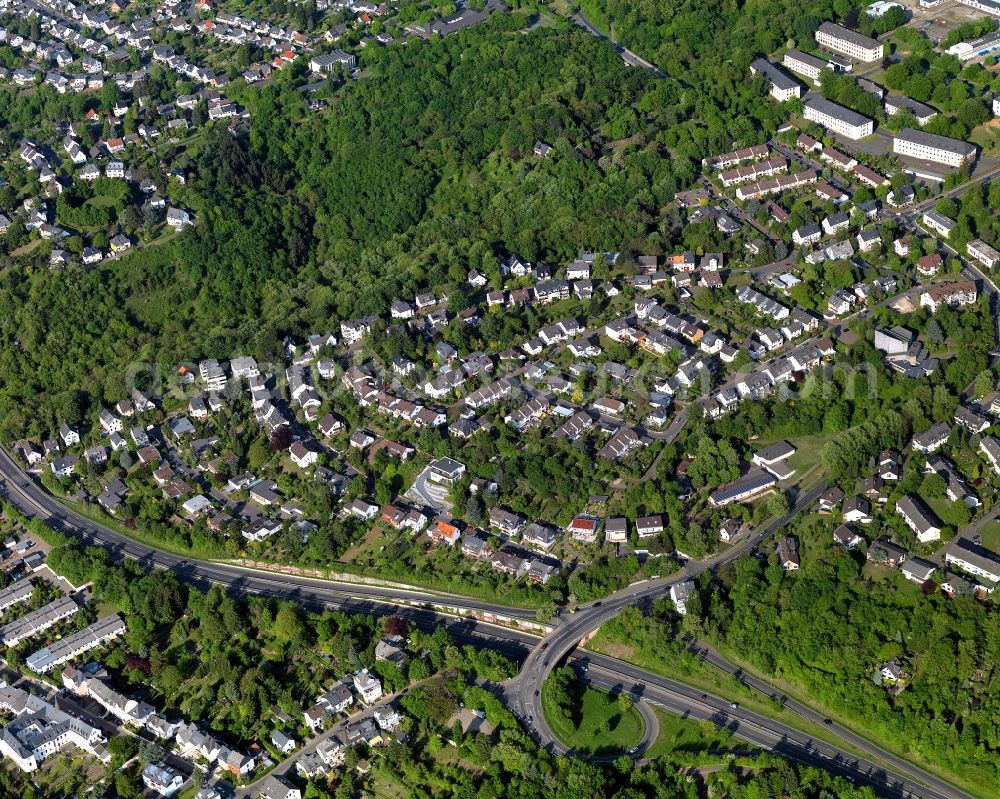 Koblenz from above - View of the Niederberg part of Koblenz in the state Rhineland-Palatinate. Koblenz is located on both sides of the rivers Rhine and Moselle and is surrounded by hills and fields. It is a university town and one of the oldest towns of Germany. The Niederberg part is located on the right riverbank of the Rhine and is a place of pilgrimage