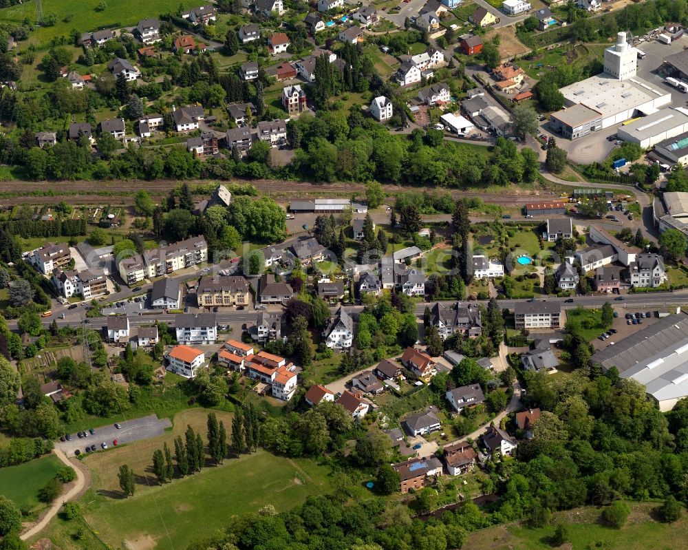 Aerial image Bendorf - View of the Sayn part of the town of Bendorf in the state of Rhineland-Palatinate. The town is located in the county district of Mayen-Koblenz on the right riverbank of the river Rhine. The town is an official tourist resort and is located on the German Limes Road. It consists of the four parts Bendorf, Sayn, Muelhofen and Stromberg. Sayn is located in the North of Bendorf